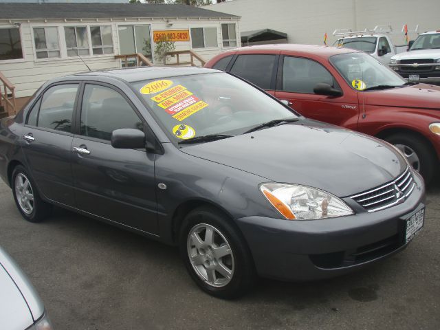 2006 MITSUBISHI LANCER ES gray this 06 mits lancer is in excellent running condition engine is me