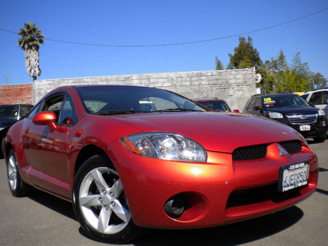 2007 MITSUBISHI ECLIPSE orange automatic transmission 2 door power windows air conditioning dual c